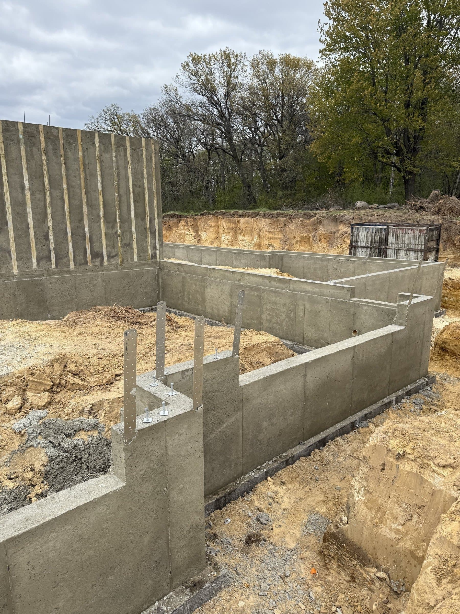Cured foundation walls at Oakridge, forms stripped.