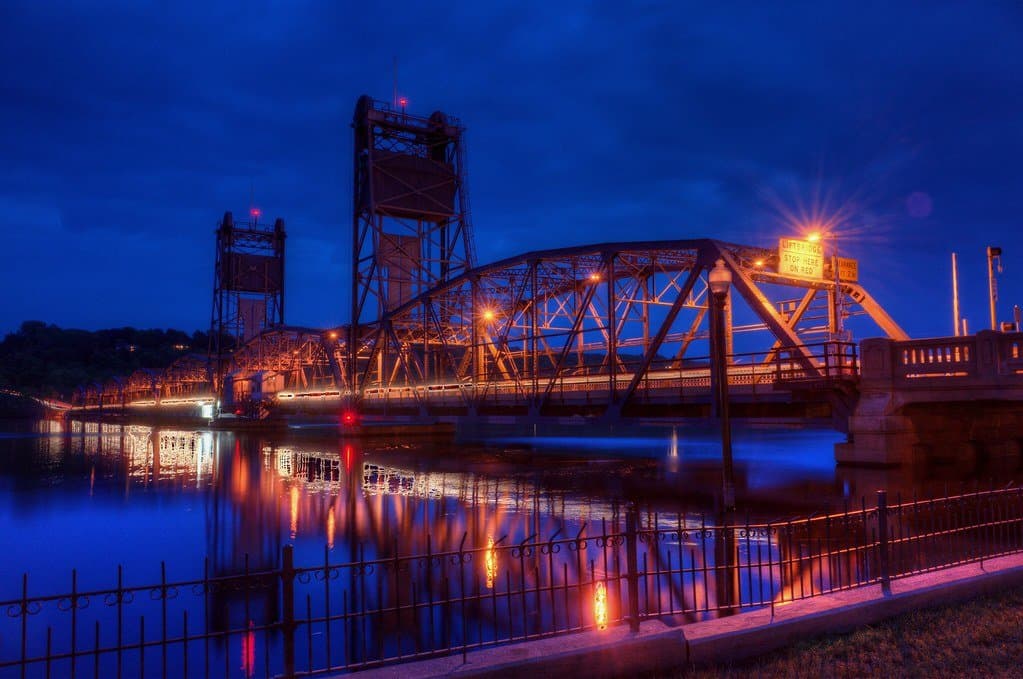 The Stillwater Lift Bridge at blue hour, lit and reflected in the St. Croix.